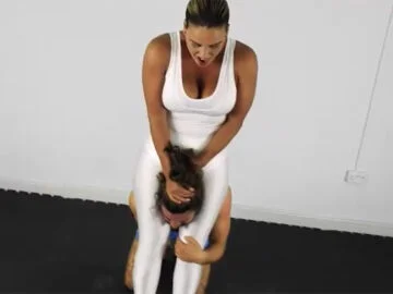 Megan Jones standing headscissor