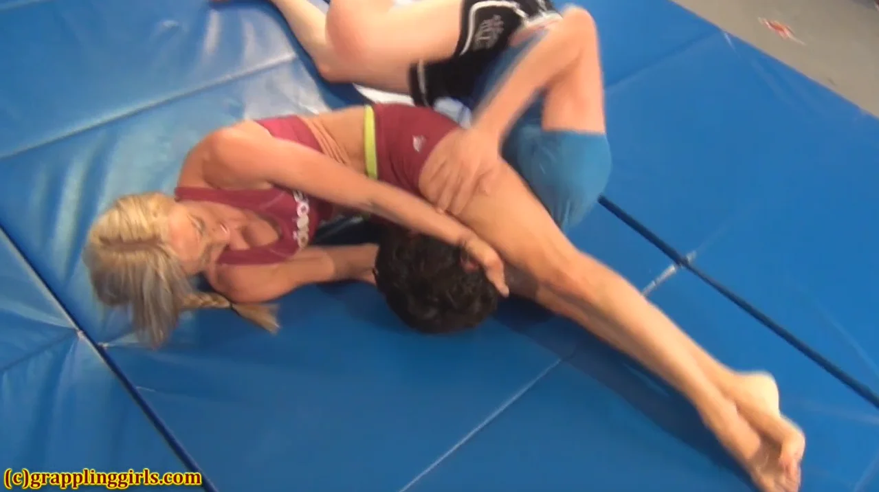 strong woman wrestling younger man