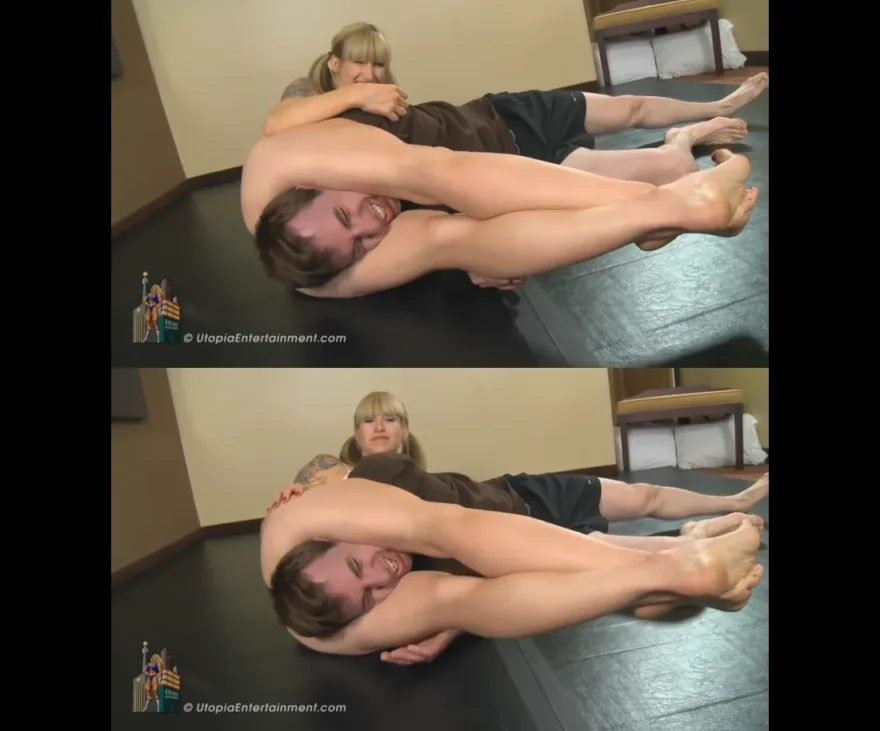 woman submits man with headscissor submission