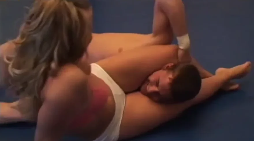 hot girl in booty shorts wrestles weaker guy