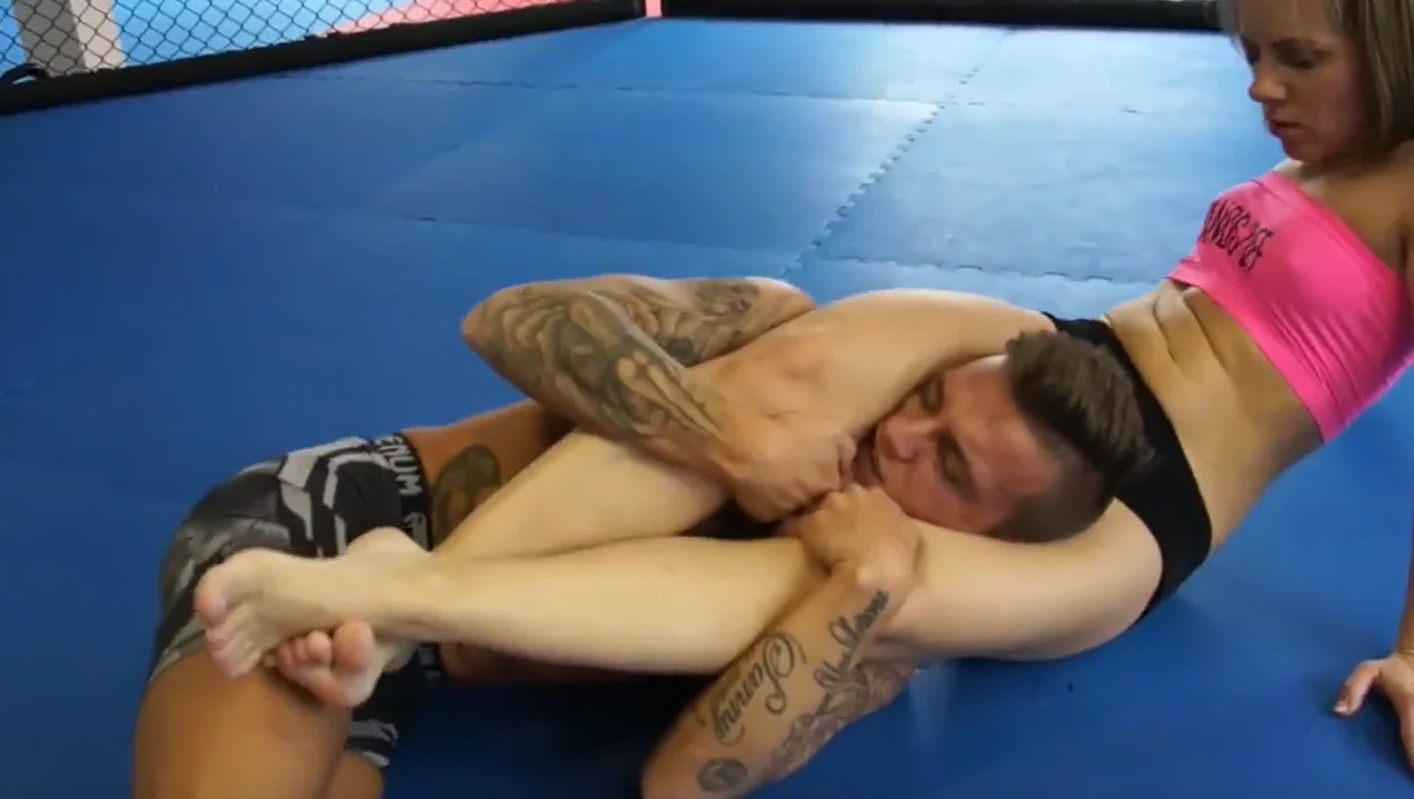 playful mixed wrestling in the gym