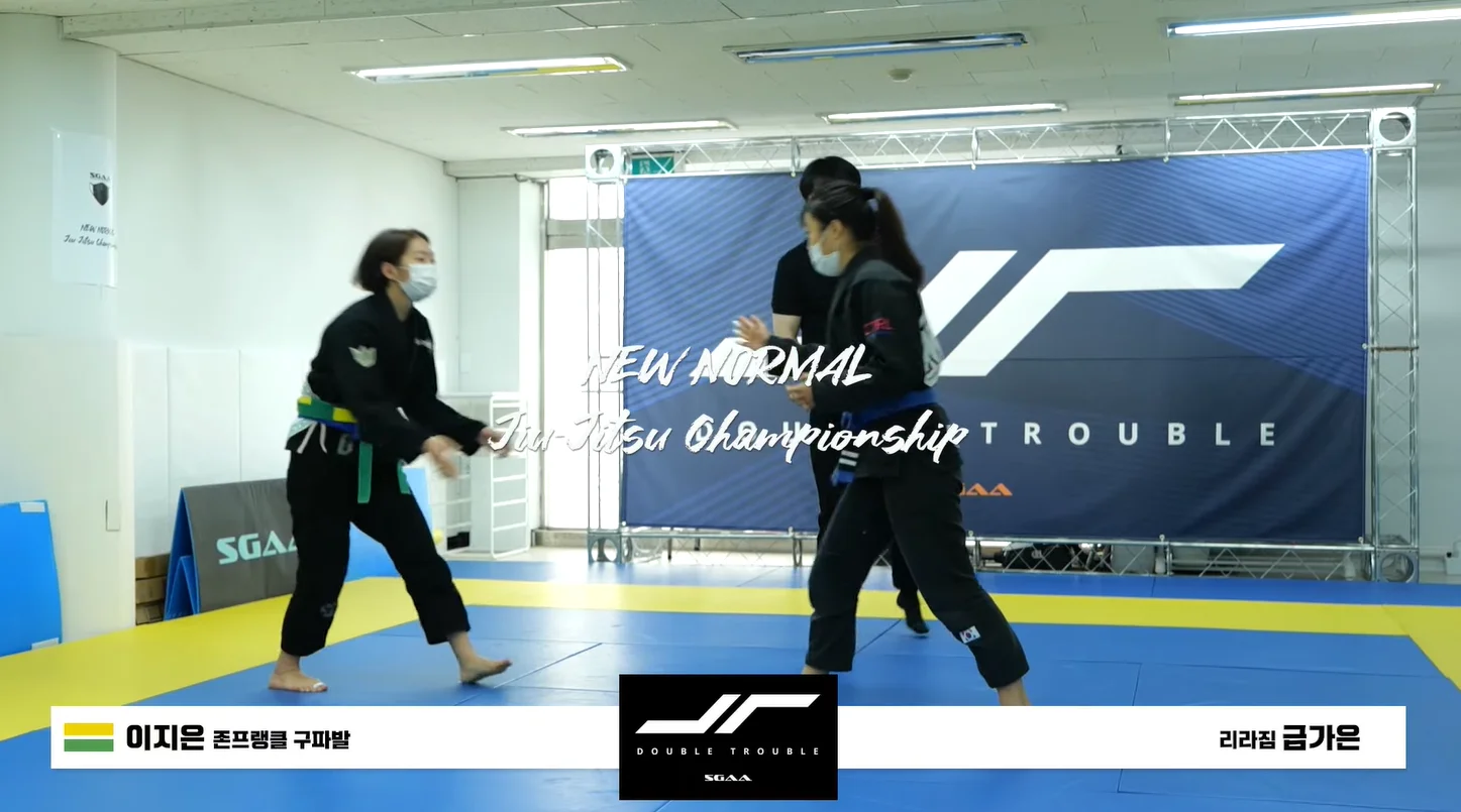 two korean girls compete in jiu jitsu