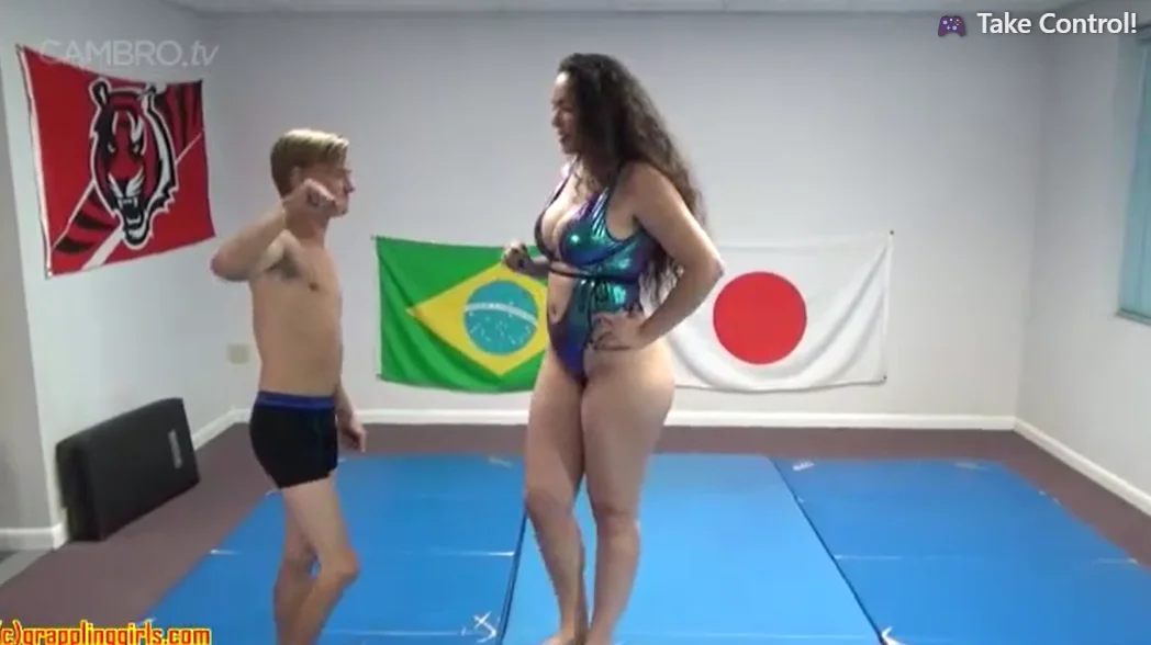 large amazon woman dominates little man in wrestling