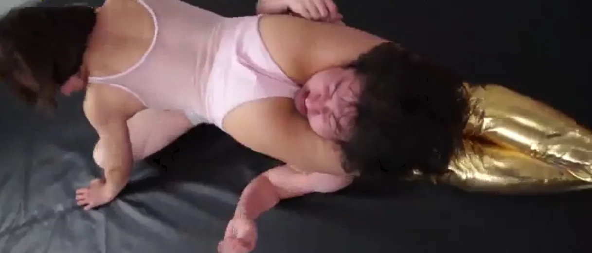 Asian Woman Wrestles and Defeats Man